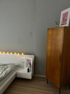 Ένα ή περισσότερα κρεβάτια σε δωμάτιο στο DNA Studio