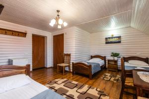 Letto o letti in una camera di Villa Anet