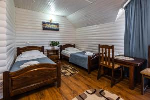 Letto o letti in una camera di Villa Anet