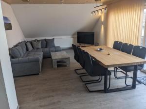 TV a/nebo společenská místnost v ubytování Ferienwohnung Lang