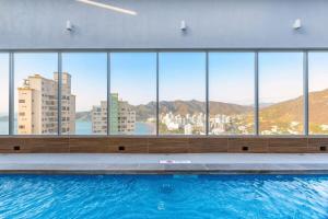 a swimming pool with a view of the city at Exclusive Luxury Apartment 2 BRD In Rodadero in Gaira