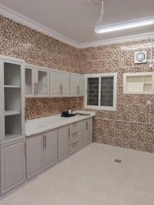 Kuchyň nebo kuchyňský kout v ubytování Maya Suits + 13 fotografií