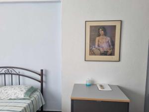 A bed or beds in a room at Houses in the Village
