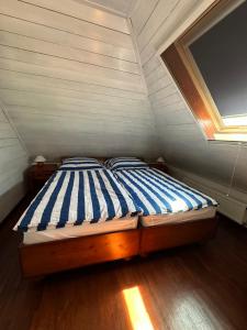Postel nebo postele na pokoji v ubytování Tahiti sunshine - Chatka na vode