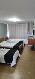 Katil atau katil-katil dalam bilik di Hotel La Rocca, Goiânia
