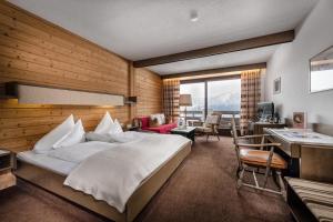Postel nebo postele na pokoji v ubytování Hotel St. Oswald