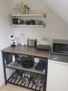Kuchyň nebo kuchyňský kout v ubytování Wohnung am Kurpark mit privater Innensauna & LED! Schlüsselbox