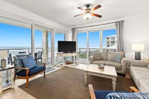 a living room with a view of the ocean at High Pointe Resort E26 in Inlet Beach