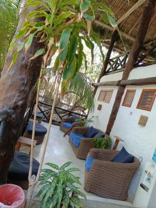 Posezení v ubytování Holbox by Xaloc