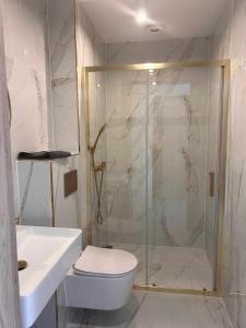 Kúpeľňa v ubytovaní Resort EDEN domki, apartamenty i pokoje