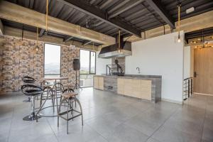 Η κουζίνα ή μικρή κουζίνα στο Alba Garden Suite