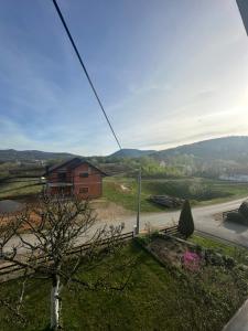 a house on the side of a road at Rooms Jure Sabljak in Grabovac +14 photos