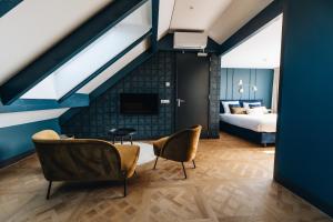 Postel nebo postele na pokoji v ubytování Hotel Renesse