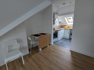 Kuchyň nebo kuchyňský kout v ubytování Top Floor Apartment