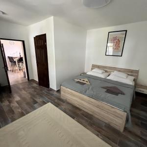 En eller flere senge i et værelse på Udvar-ház
