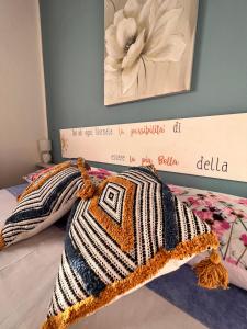 מיטה או מיטות בחדר ב-Casa L ulivo
