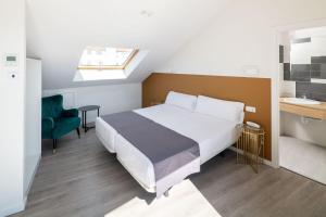 Postel nebo postele na pokoji v ubytování Hotel Concheiros