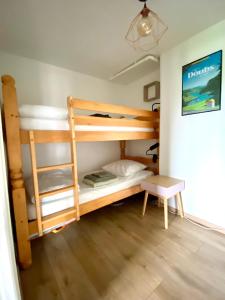 Posteľ alebo postele v izbe v ubytovaní Appartement 4-6 personnes, vue lac
