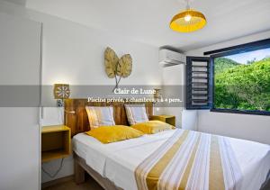 Postel nebo postele na pokoji v ubytování Jo'z le rêve