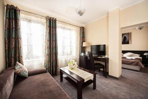 Postel nebo postele na pokoji v ubytování Hotel Willa Adriana