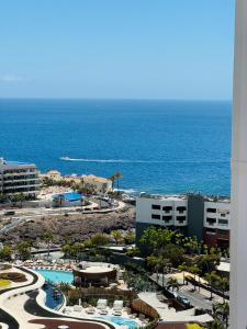 an aerial view of a resort and the ocean at KAI Apartment - AC in Playa Paraiso