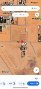 eine Karte einer Wüste mit einem roten Kreis in der Unterkunft شاليه 1 in Al Ḩazm