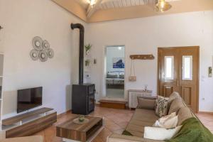 Posezení v ubytování Olivetree private Villa