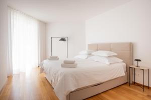 Ein Bett oder Betten in einem Zimmer der Unterkunft Adriatic Queen Residence