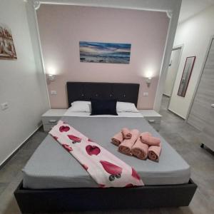 Postel nebo postele na pokoji v ubytování ACRONE GUEST HOUSE Centro Città (Locazione Turistica)