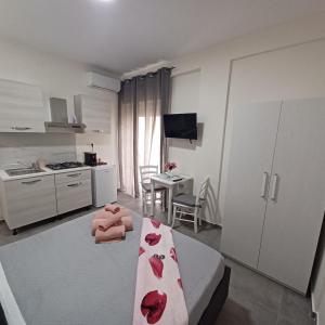 Kuchyň nebo kuchyňský kout v ubytování ACRONE GUEST HOUSE Centro Città (Locazione Turistica)