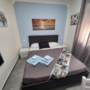 Postel nebo postele na pokoji v ubytování ACRONE GUEST HOUSE Centro Città (Locazione Turistica)