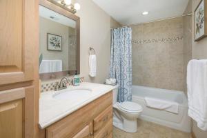 a bathroom with a sink and a toilet and a shower at Parkview Retreat in Windsor +22 photos