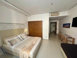 Posteľ alebo postele v izbe v ubytovaní Interno 5 B&B