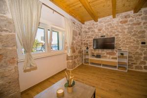 Μια τηλεόραση ή/και κέντρο ψυχαγωγίας στο House Olivera