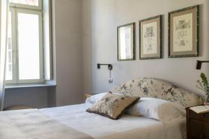 Postel nebo postele na pokoji v ubytování ALMA bed & breakfast
