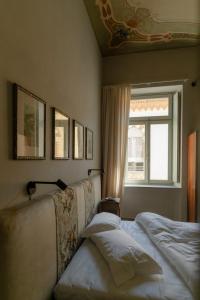 Postel nebo postele na pokoji v ubytování ALMA bed & breakfast