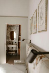 Postel nebo postele na pokoji v ubytování ALMA bed & breakfast