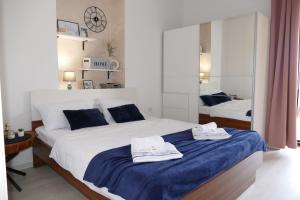 Postel nebo postele na pokoji v ubytování Apartment and Rooms Zora