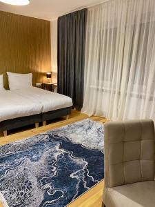 Ένα ή περισσότερα κρεβάτια σε δωμάτιο στο DOBA RENT Wysockiego 104