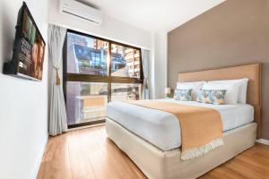 Modern Apartments in Palermo - by BueRentals客房内的一张或多张床位