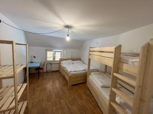 Postel nebo postele na pokoji v ubytování Statek Losiny + 25 fotografií