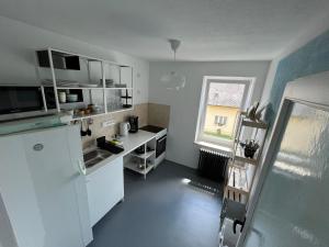 Eldhús eða eldhúskrókur á Statek Losiny