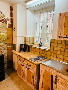 a kitchen with a sink and a counter top at Neckarblick,Natur, Altstadt in Hirschhorn