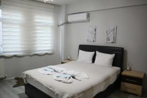 Ένα ή περισσότερα κρεβάτια σε δωμάτιο στο ERKUL OLD CITY