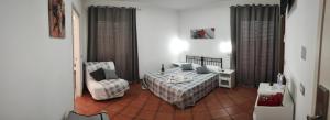 Postel nebo postele na pokoji v ubytování Royal House Fiumicino + 2 fotografie