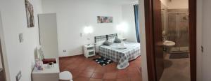 Postel nebo postele na pokoji v ubytování Royal House Fiumicino