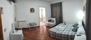 Postel nebo postele na pokoji v ubytování Royal House Fiumicino