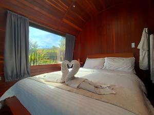 Voodi või voodid majutusasutuse Glamping The Mountain toas