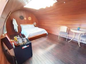 Voodi või voodid majutusasutuse Glamping The Mountain toas