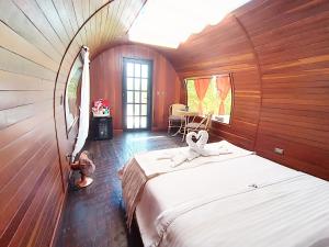 Voodi või voodid majutusasutuse Glamping The Mountain toas